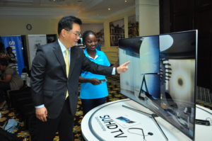 Jung Hyun Park, Vice President and Managing Director of Samsung Electronics East Africa Ltd showcases the new SUHD Tv.    Photo By Allan Muturi