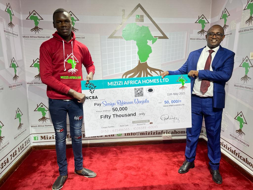 Mizizi Africa Homes George Mburu hands over Cheque to Simiyu Robinson
